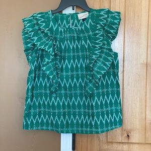 Never worn ruffle sleeve top.
